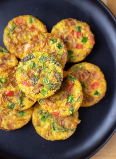 vegan frittata muffins stacked on a plate
