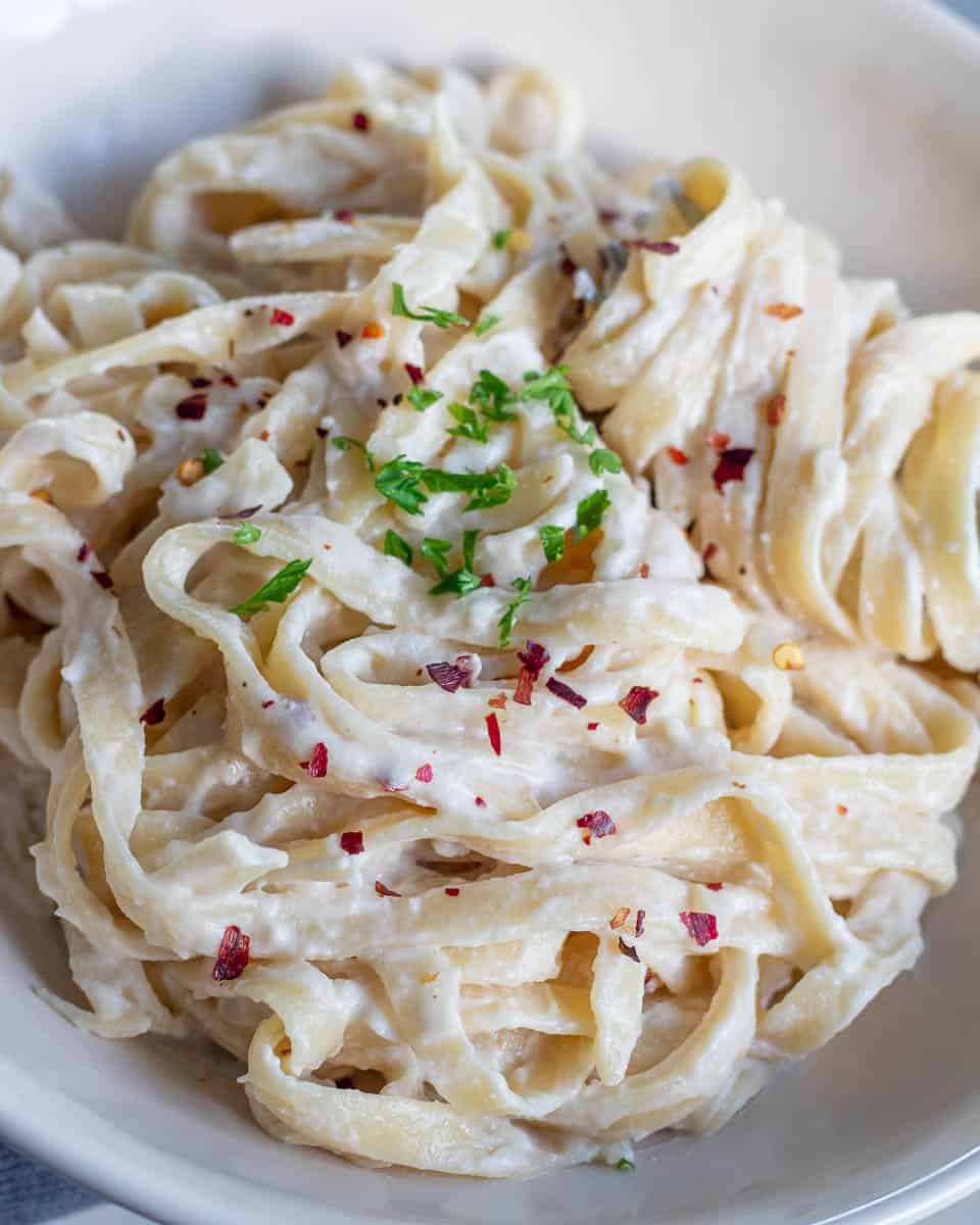 macro shot of vegan alfredo to show sauce texture