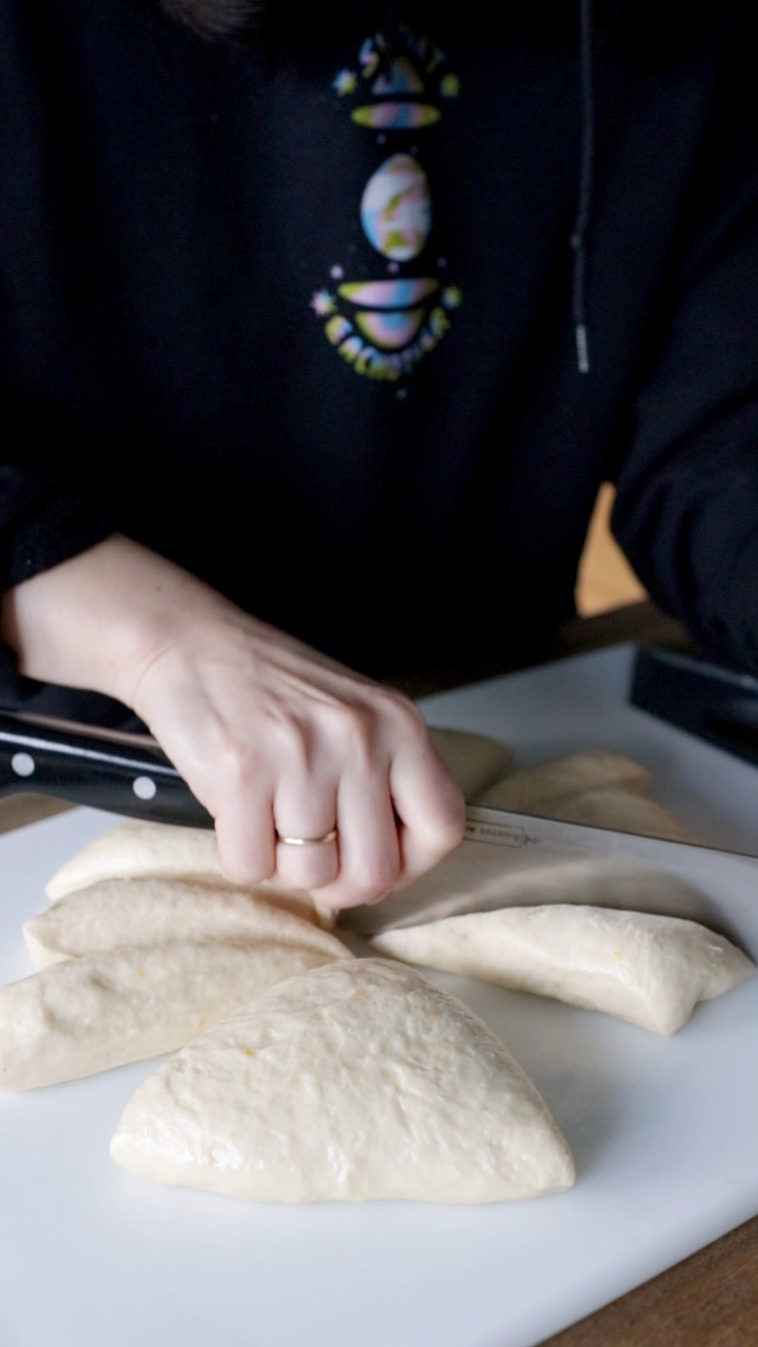 vegan sufganiyot dough being cut into 12 uniform pieces