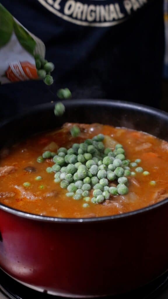 adding in frozen peas