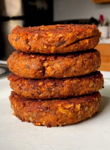 a stack of four lentil burgers