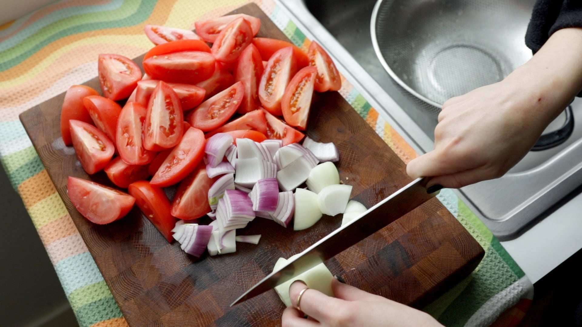 chopping red onion into large chunks