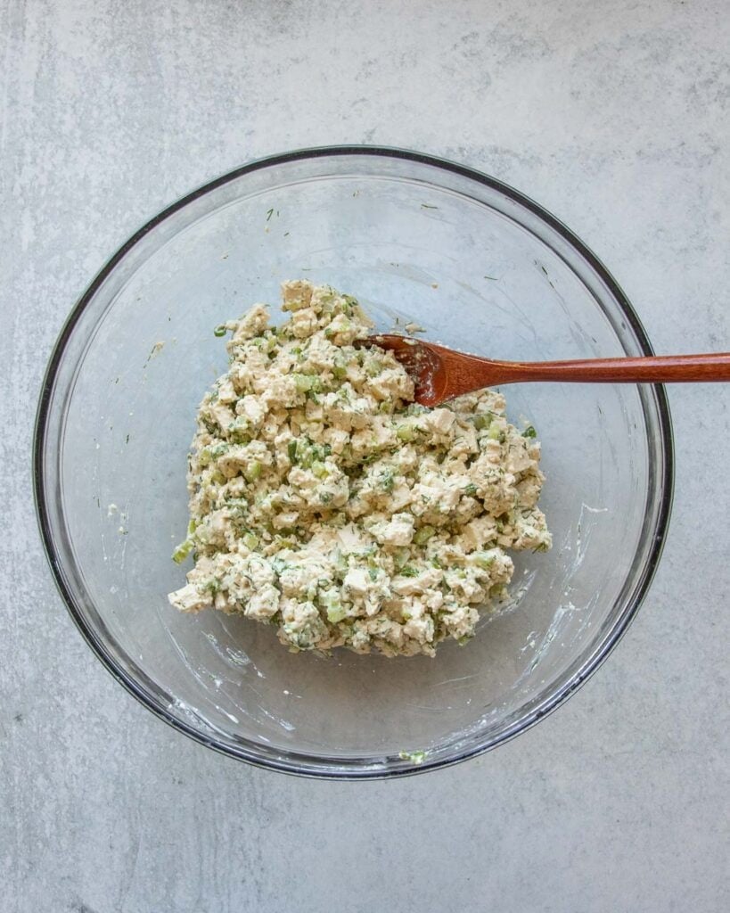 An overhead shot of tofu egg salad, just-mixed in the bowl.