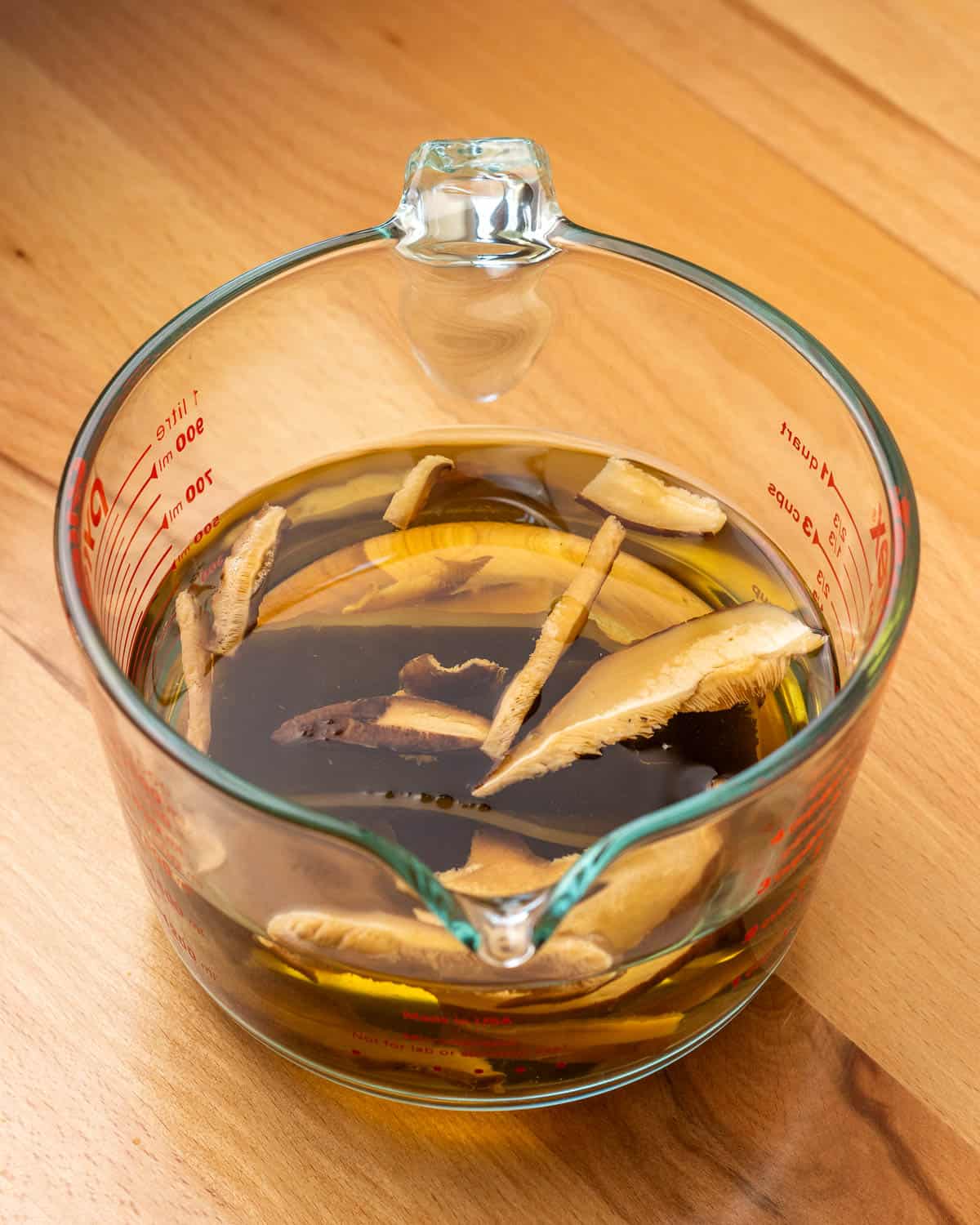 shiitake mushrooms and konbu soaking in water