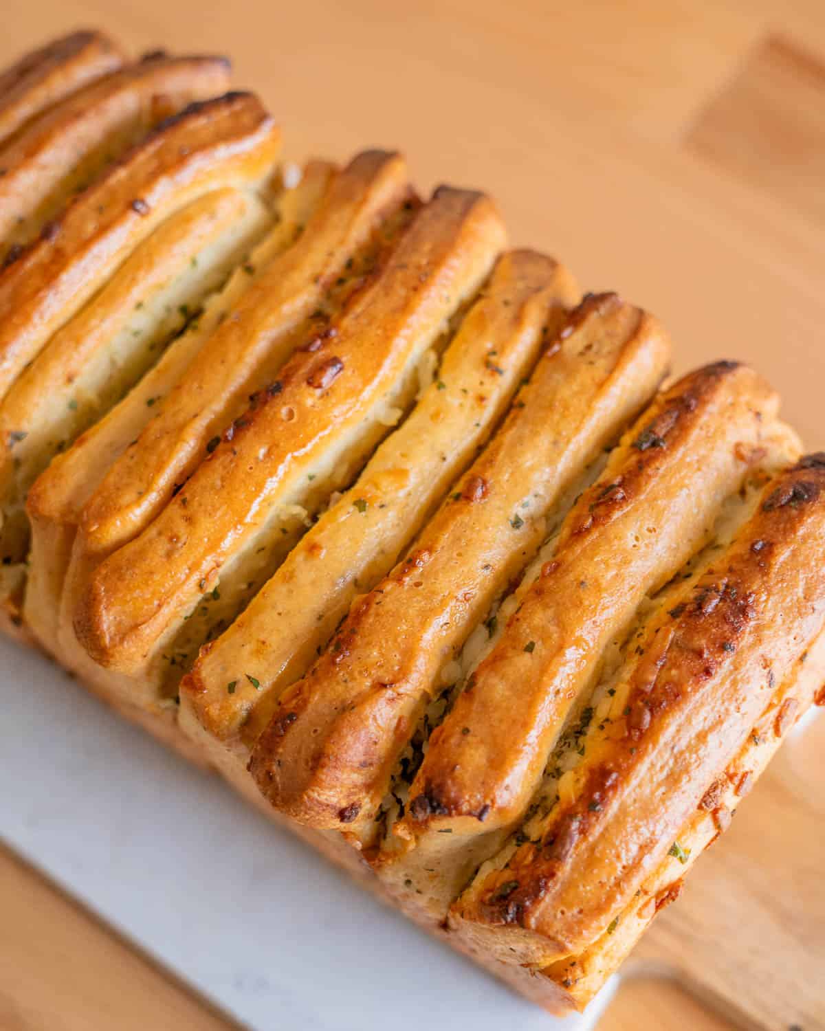 close up overhead shot of garlic herb pull-apart bread