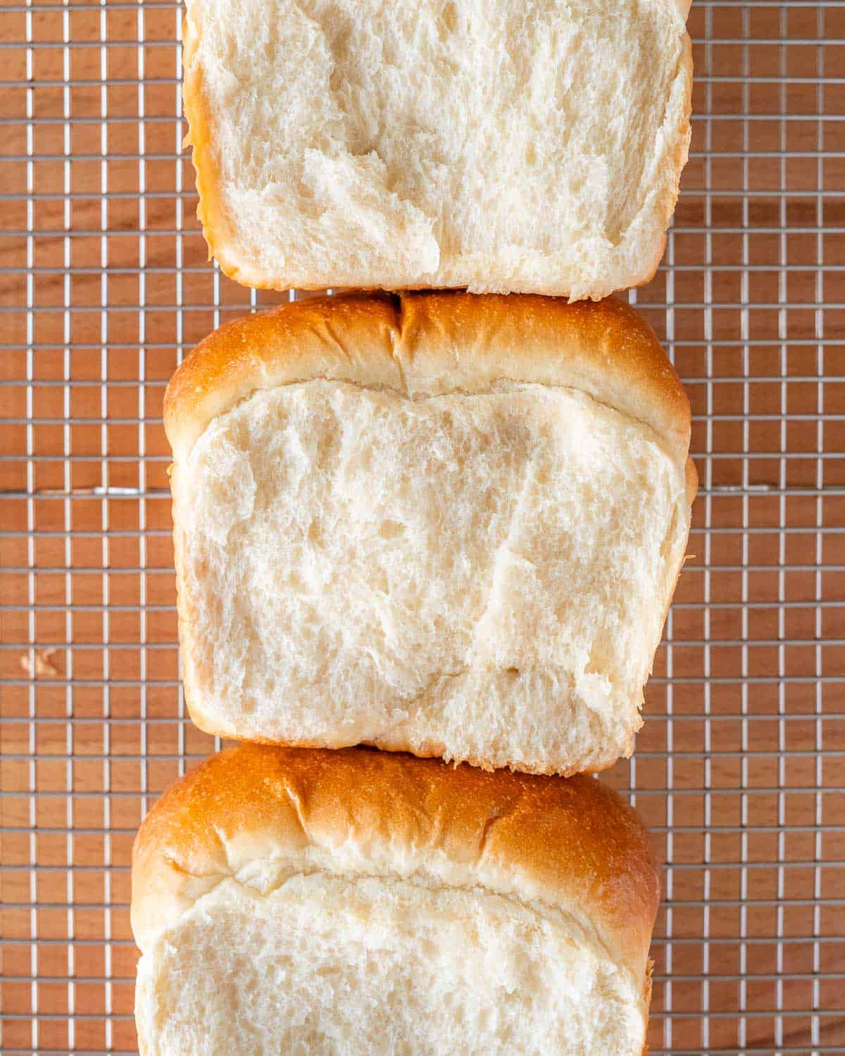 overhead close up shot of the cross-section of a loaf of vegan milk bread