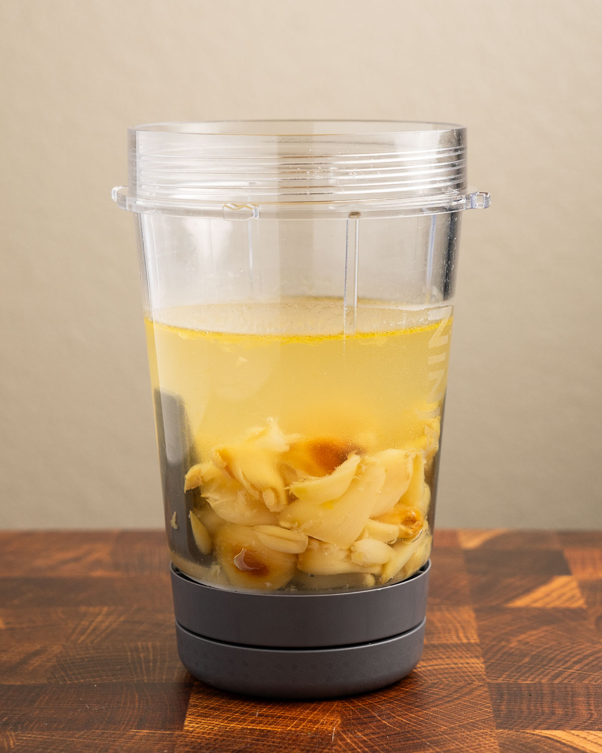 roasted garlic and broth in a blender cup
