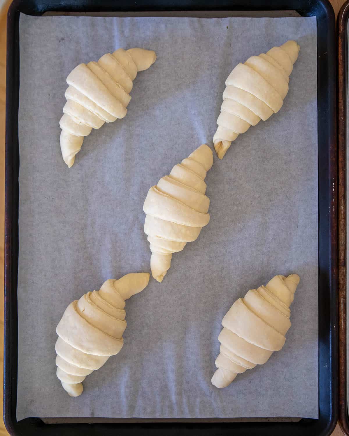 uncooked vegan croissants on a baking tray