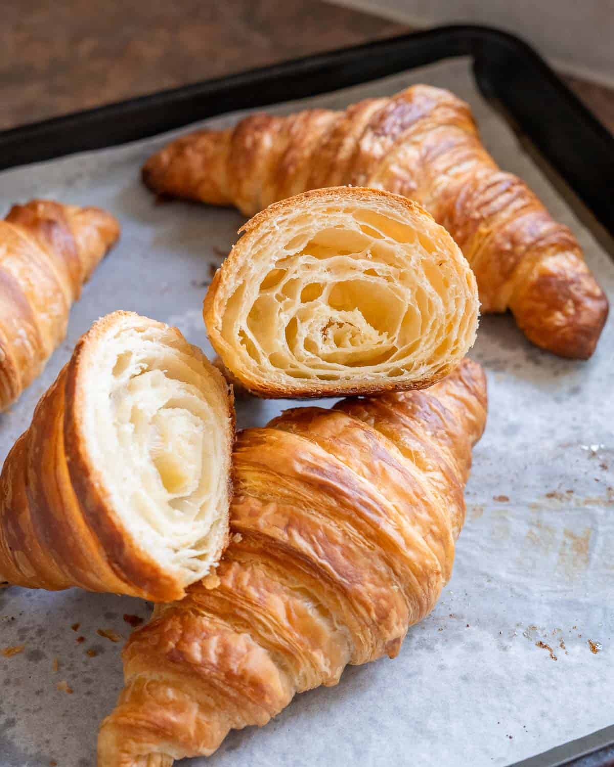 cross-section of a vegan croissant with the flaky layers visible