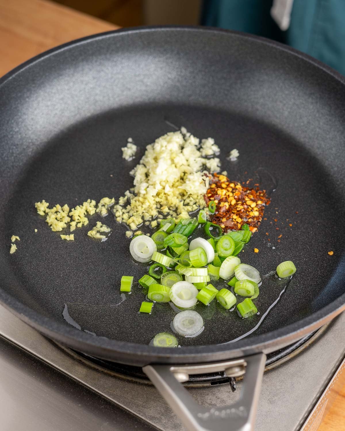 Aromatics and oil in pan.