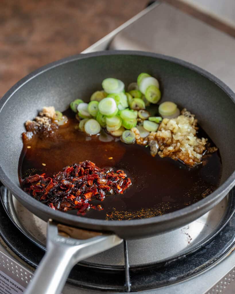 Add sauce ingredients to small pan