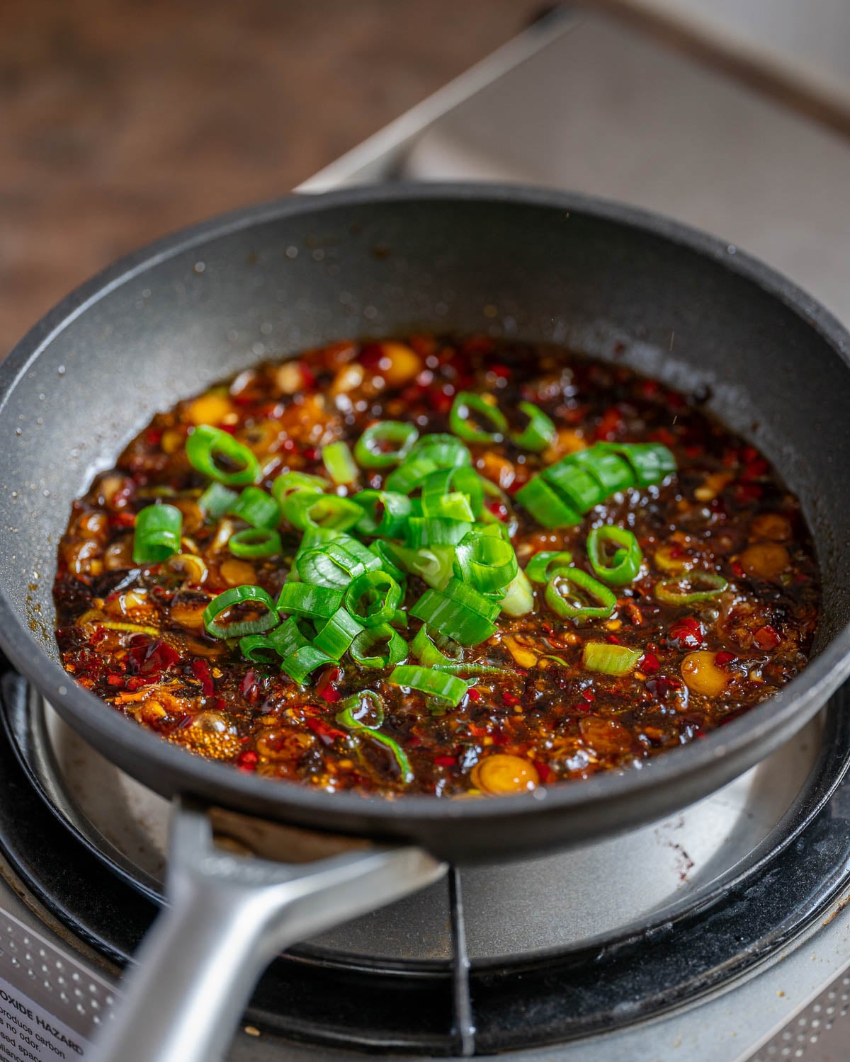 Finish with green parts of scallions