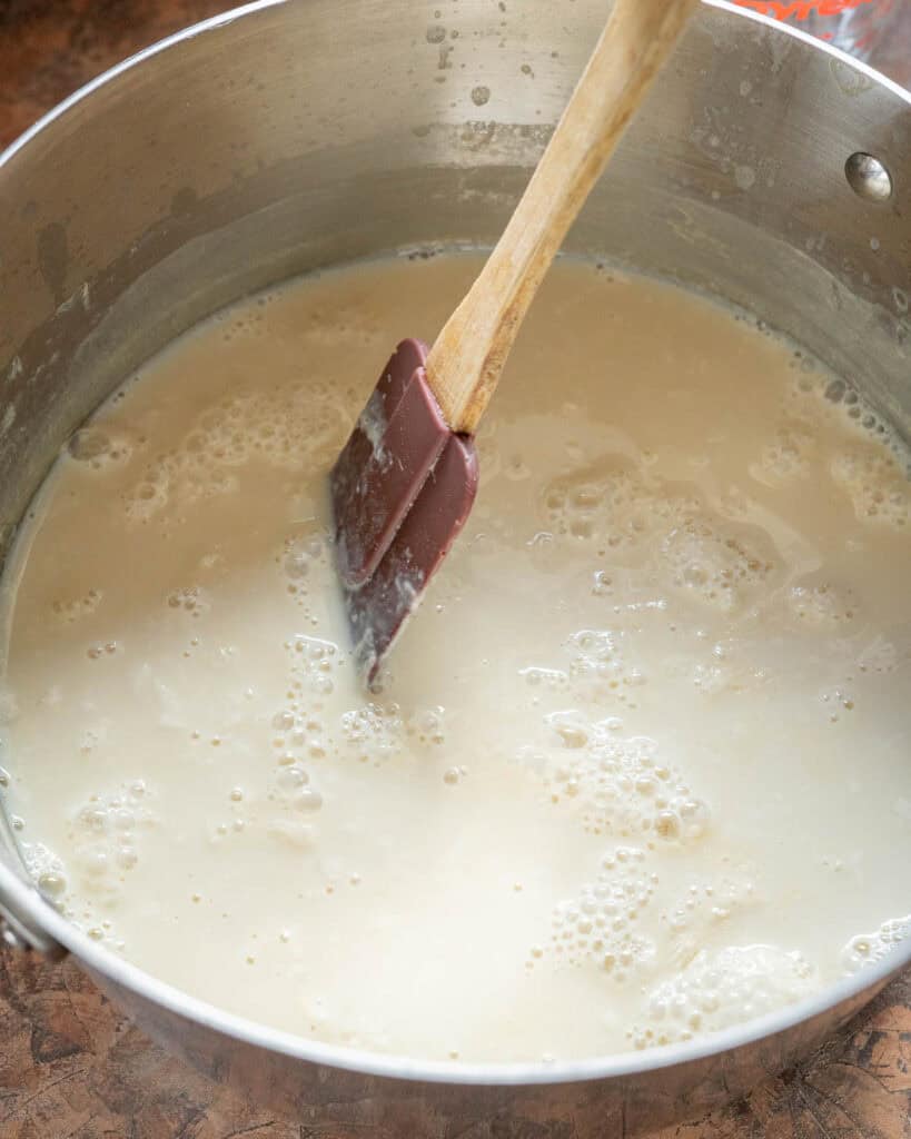 Stirring to separate curds