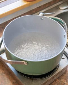 Water boiling in a large heavy pot