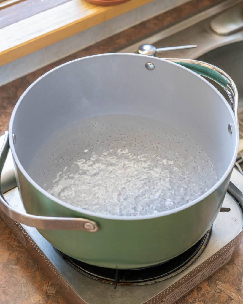 Water boiling in a large heavy pot