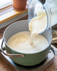 Adding blended soy milk to boiling water