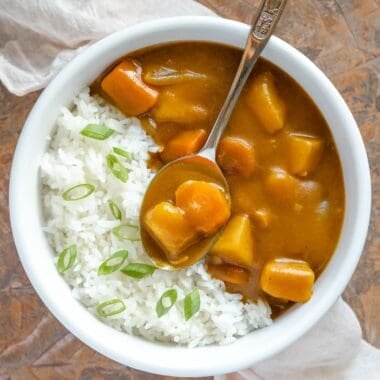 Overhead shot of a bowl of vegan Japanese curry and white rice