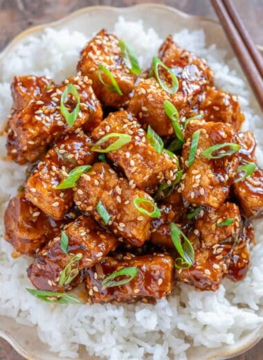 Overhead shot of sesame tofu plated with white rice