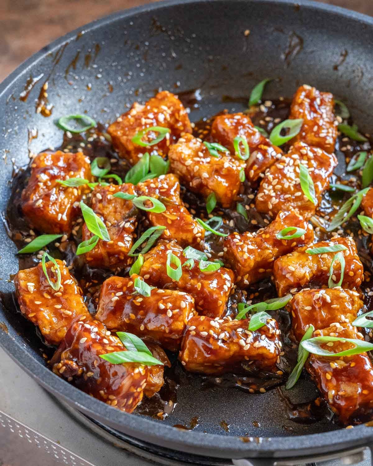 Add sesame seeds and scallions