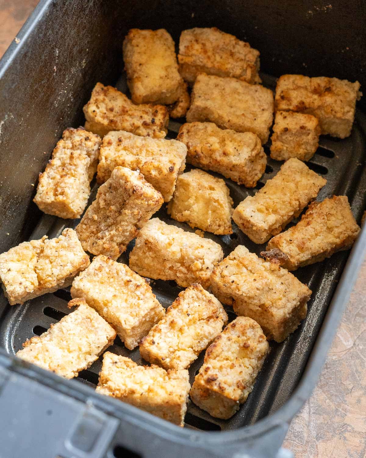 Air fry tofu until crispy