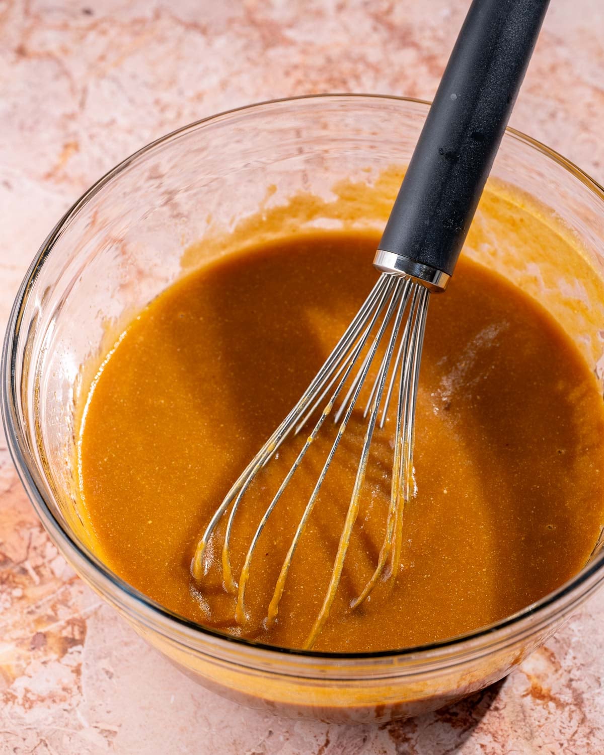 wet ingredients combined in a mixing bowl