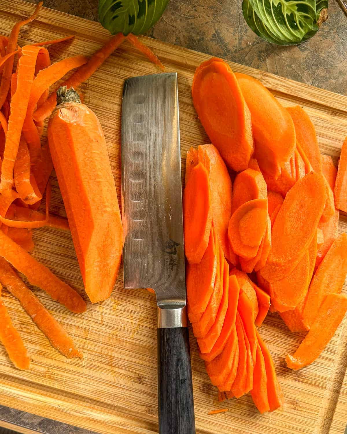 carrots thinly sliced on a bias