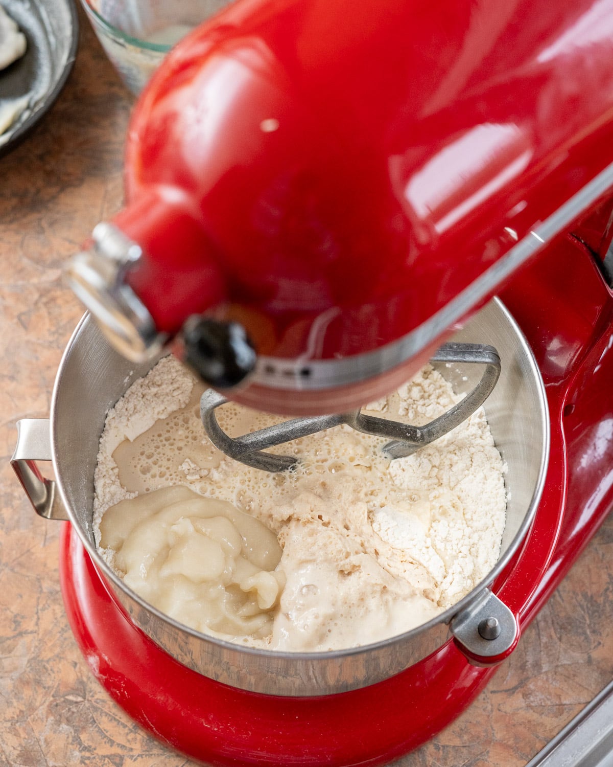 Ingredients for vegan milk bread in stand mixer bowl