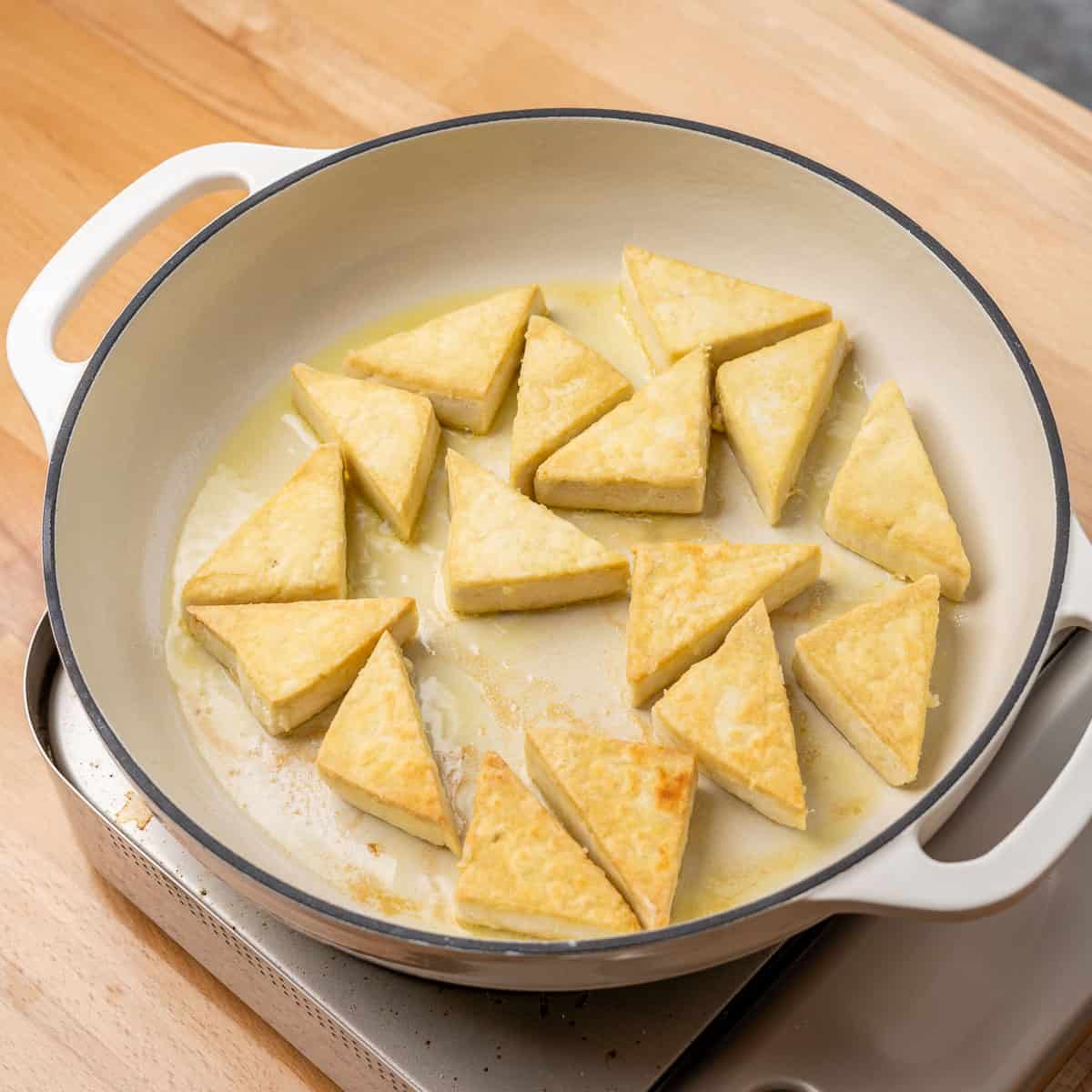 Browned tofu in a pan