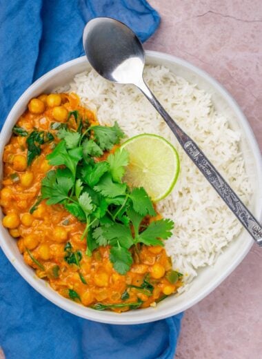 Coconut chickpea curry in a bowl with basmati rice