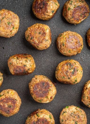 overhead shot of vegan greek meatballs in a pan