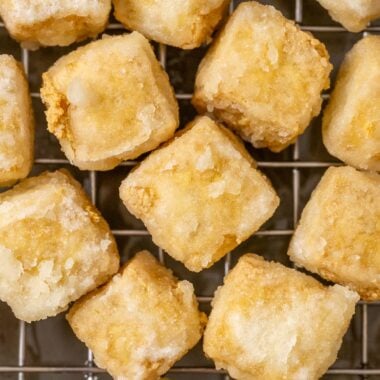 crispy fried tofu on a wire rack