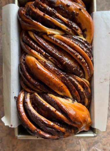 overhead shot of vegan chocolate babka in a baking pan