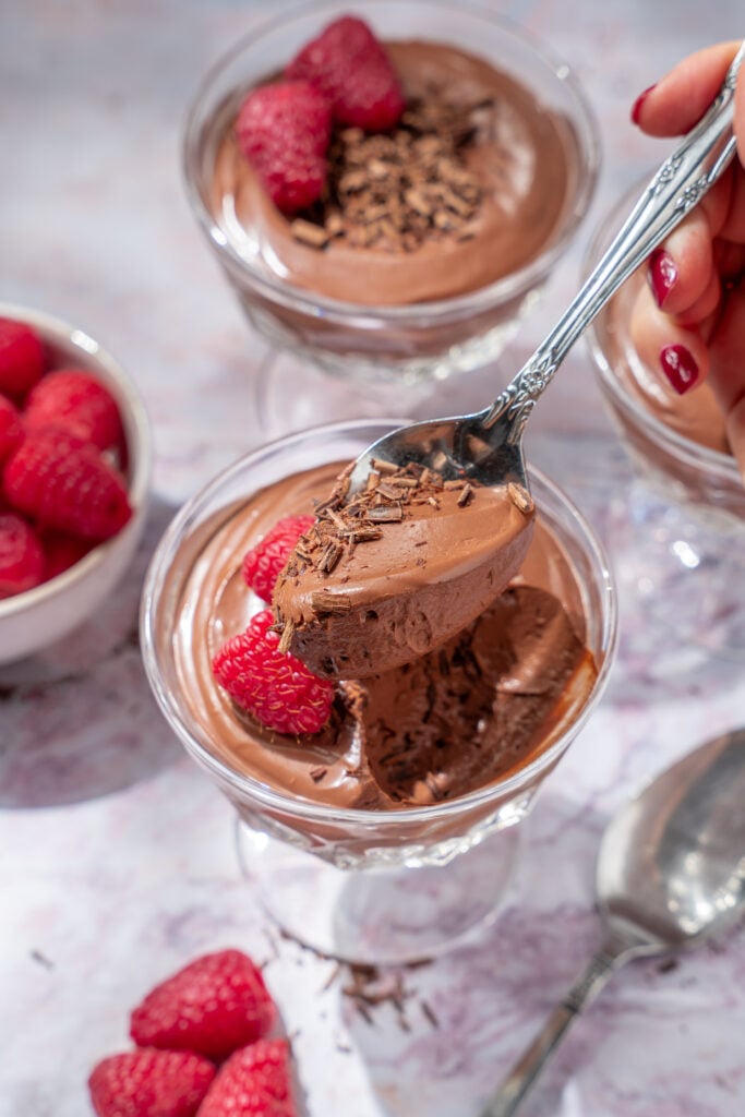 spoonful of vegan chocolate mousse to show whipped texture