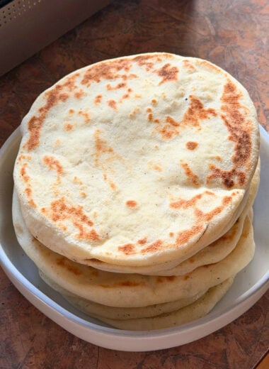 a stack of fresh-baked pita bread