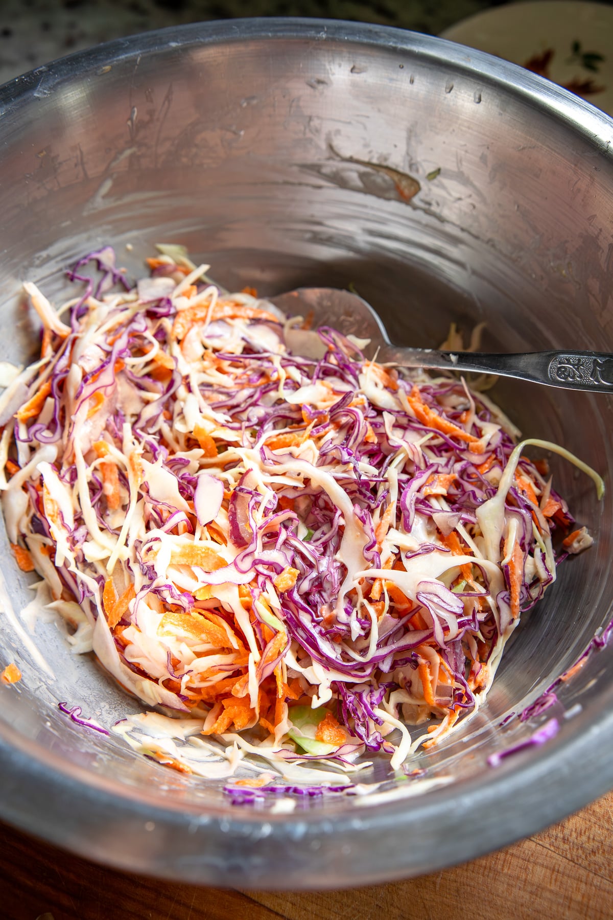 a mixing bowl of coleslaw